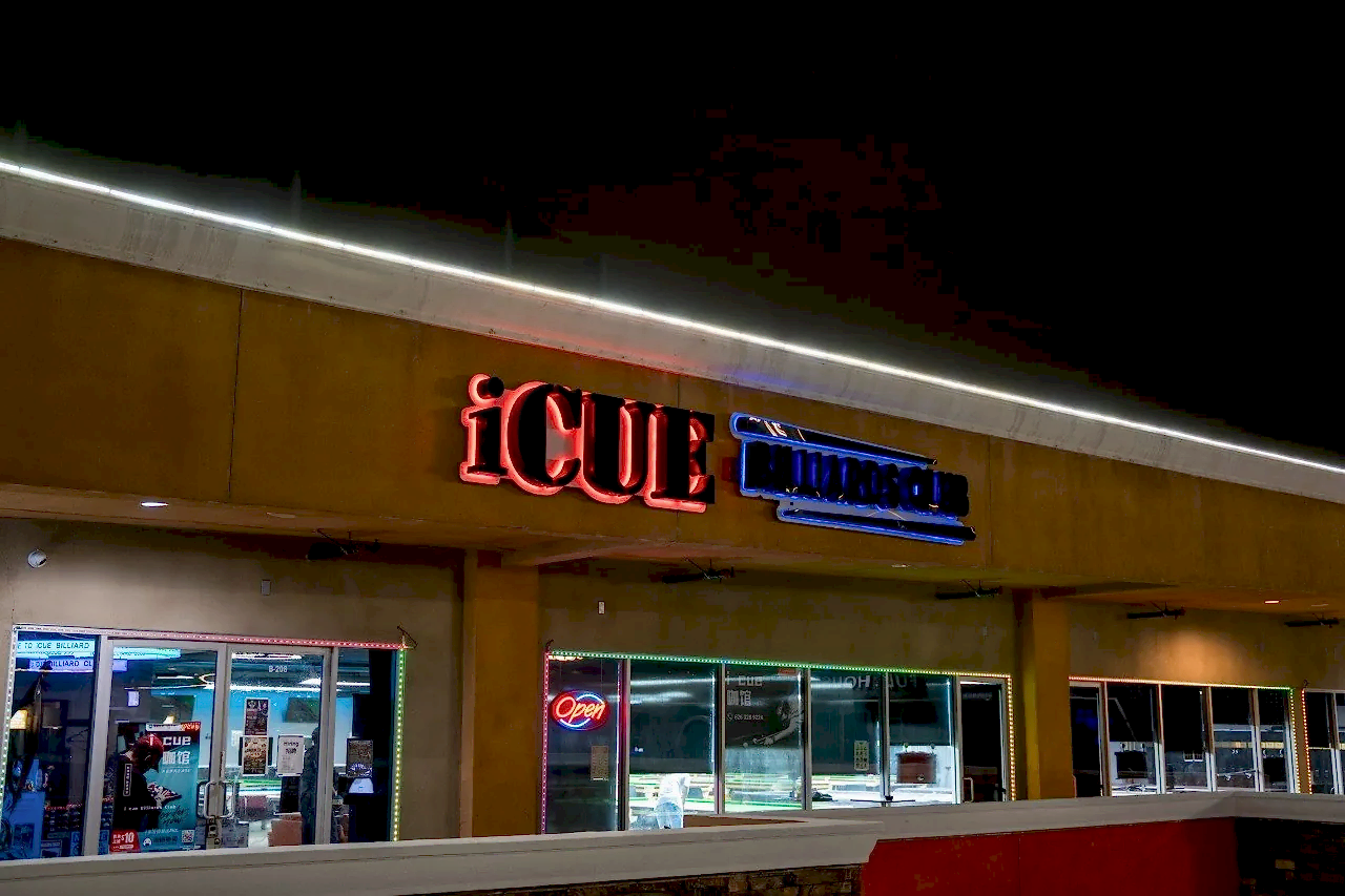 iCUE Billiard Club storefront sign and entrance at night in Rowland Heights